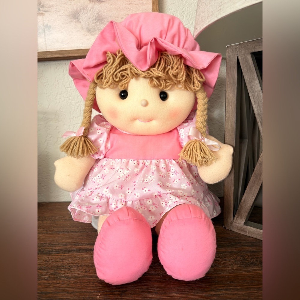 antics collection doll with pink dress floral great condition